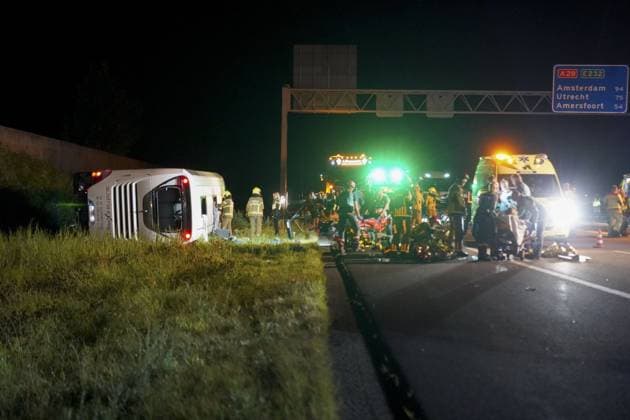 WEZEP - Emergency services on the A28 near Wezep (Gelderland) where multiple people were injured in an accident involving a coach and a delivery van. There were reportedly more than fifty people on board the bus. PERSBUREAU HEITINK ANP netherlands out - belgium out  Copyright: xx x566165441x originalFilename: 566165441.jpg
