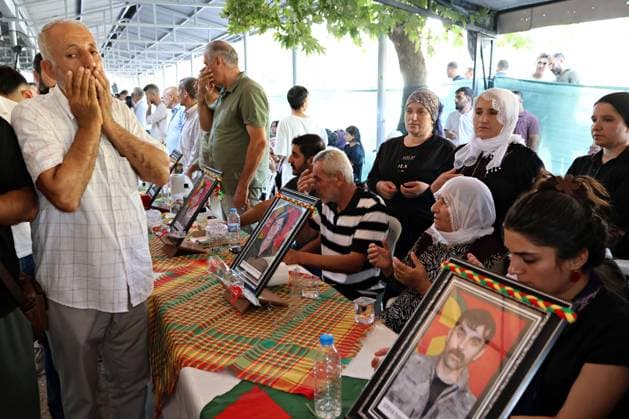 August 23, 2026, Diyarbakir, Turkey: Visitors are seen praying for PKK guerrillas who died in the conflict during the ceremony. Three days of condolences were established and a memorial program was organized in the city of Diyarbakir in Turkey for 49 Kurdistan Workers Party (PKK) guerrillas who died in armed clashes with the Turkish army on different dates in the past years and whose identities have just been announced. Abdullah Ocalan, the leader of the armed Kurdish PKK party who has been in prison in Turkey for 26 years, had decided two years ago to disarm his party and start peace talks with the state of Turkey. Diyarbakir Turkey  - ZUMAs197 20260823_aaa_s197_373 Copyright: xMehmetxMasumxSuerx