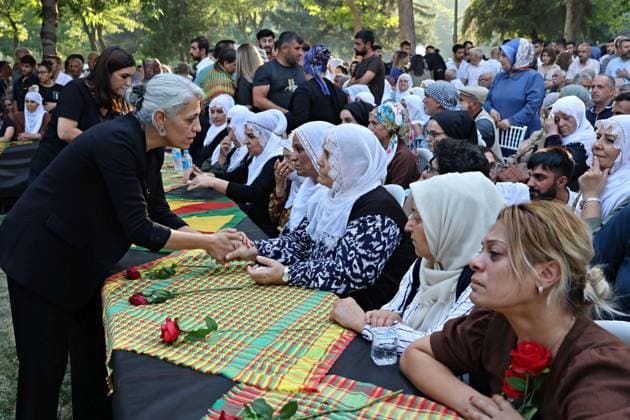 August 23, 2026, Diyarbakir, Turkey: Democratic Regions Party (DBP) Co-Chair Cigdem Kilicgun Ucar is seen offering condolences to the relatives of the deceased PKK guerrillas. Three days of condolences were established and a memorial program was organized in the city of Diyarbakir in Turkey for 49 Kurdistan Workers Party (PKK) guerrillas who died in armed clashes with the Turkish army on different dates in the past years and whose identities have just been announced. Abdullah Ocalan, the leader of the armed Kurdish PKK party who has been in prison in Turkey for 26 years, had decided two years ago to disarm his party and start peace talks with the state of Turkey. Diyarbakir Turkey  - ZUMAs197 20260823_aaa_s197_376 Copyright: xMehmetxMasumxSuerx