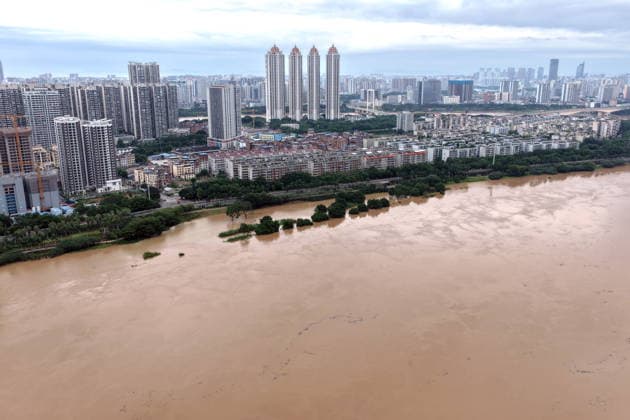 NANNING, CHINA - AUGUST 24: Aerial view of floodwaters submerging riverside park and walkway along the Yong River on August 24, 2026 in Nanning, Guangxi Zhuang Autonomous Region of China. Heavy rainfall brought by Typhoon Narra flooded the low-lying areas in south China s Guangxi Zhuang Autonomous Region.  Copyright: xVCGx 111661812020