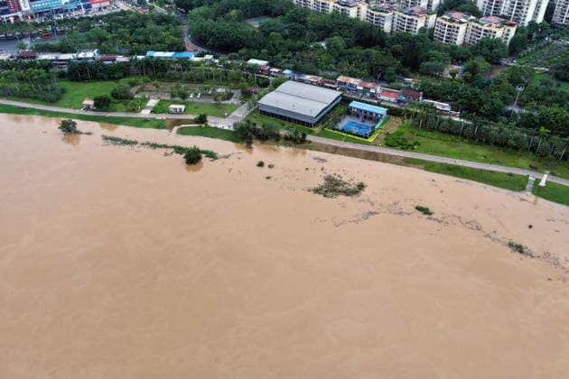 NANNING, CHINA - AUGUST 24: Aerial view of floodwaters submerging riverside park and walkway along the Yong River on August 24, 2026 in Nanning, Guangxi Zhuang Autonomous Region of China. Heavy rainfall brought by Typhoon Narra flooded the low-lying areas in south China s Guangxi Zhuang Autonomous Region.  Copyright: xVCGx 111661812024
