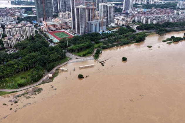 NANNING, CHINA - AUGUST 24: Aerial view of floodwaters submerging riverside park and walkway along the Yong River on August 24, 2026 in Nanning, Guangxi Zhuang Autonomous Region of China. Heavy rainfall brought by Typhoon Narra flooded the low-lying areas in south China s Guangxi Zhuang Autonomous Region.  Copyright: xVCGx 111661812025