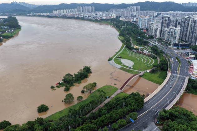NANNING, CHINA - AUGUST 24: Aerial view of floodwaters submerging riverside park and walkway along the Yong River on August 24, 2026 in Nanning, Guangxi Zhuang Autonomous Region of China. Heavy rainfall brought by Typhoon Narra flooded the low-lying areas in south China s Guangxi Zhuang Autonomous Region.  Copyright: xVCGx 111661812026
