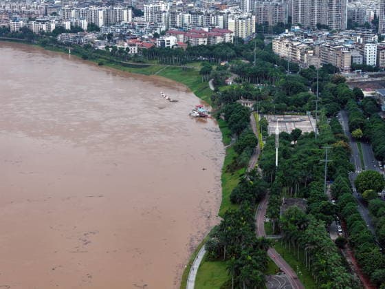 NANNING, CHINA - AUGUST 24: Aerial view of floodwaters submerging riverside park and walkway along the Yong River on August 24, 2026 in Nanning, Guangxi Zhuang Autonomous Region of China. Heavy rainfall brought by Typhoon Narra flooded the low-lying areas in south China s Guangxi Zhuang Autonomous Region.  Copyright: xVCGx 111661812015