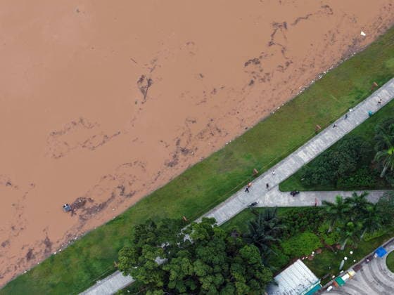 NANNING, CHINA - AUGUST 24: Aerial view of floodwaters submerging riverside park and walkway along the Yong River on August 24, 2026 in Nanning, Guangxi Zhuang Autonomous Region of China. Heavy rainfall brought by Typhoon Narra flooded the low-lying areas in south China s Guangxi Zhuang Autonomous Region.  Copyright: xVCGx 111661812016