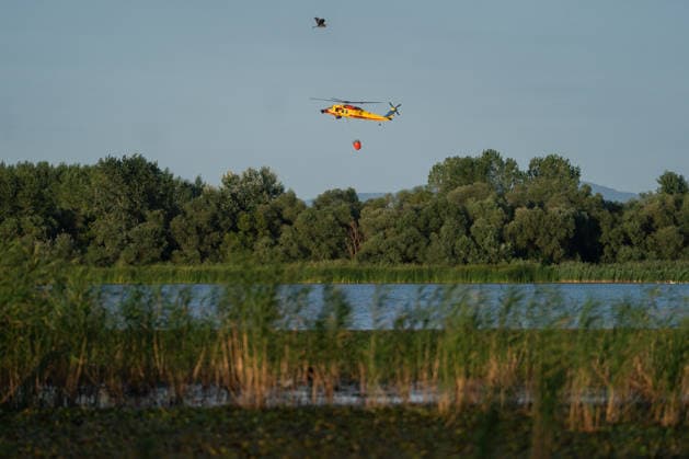 August 24, 2026, Kajtasovo, Vojvodina, Serbia: 2026823, Kajtasovo, Serbia -The European Union is actively assisting Serbia in battling severe wildfires at Serbia s request through the EU Civil Protection Mechanism, deploying four firefighting helicopters from Romania, Slovakia, the Czech Republic, and Germany, alongside ground response teams to contain large blazes like the one in the Deliblato Sands. A Romanian rescEU Black Hawk helicopter. Kajtasovo Serbia  - ZUMAd223 20260824_zip_d223_001 Copyright: xMarkoxDimicx