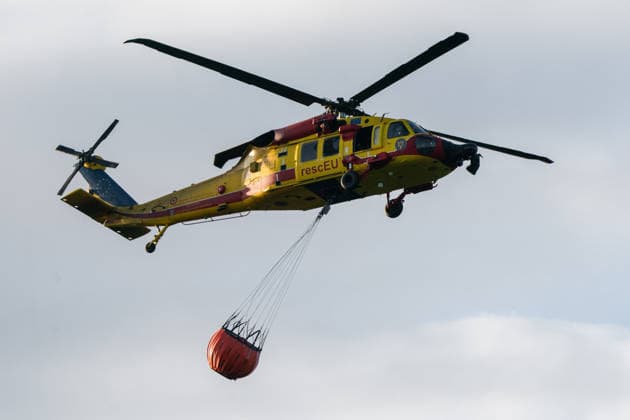 August 24, 2026, Kajtasovo, Vojvodina, Serbia: 2026823, Kajtasovo, Serbia -The European Union is actively assisting Serbia in battling severe wildfires at Serbia s request through the EU Civil Protection Mechanism, deploying four firefighting helicopters from Romania, Slovakia, the Czech Republic, and Germany, alongside ground response teams to contain large blazes like the one in the Deliblato Sands. A Romanian rescEU Black Hawk helicopter. Kajtasovo Serbia  - ZUMAd223 20260824_zip_d223_002 Copyright: xMarkoxDimicx