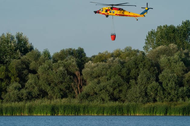 August 24, 2026, Kajtasovo, Vojvodina, Serbia: 2026823, Kajtasovo, Serbia -The European Union is actively assisting Serbia in battling severe wildfires at Serbia s request through the EU Civil Protection Mechanism, deploying four firefighting helicopters from Romania, Slovakia, the Czech Republic, and Germany, alongside ground response teams to contain large blazes like the one in the Deliblato Sands. A Romanian rescEU Black Hawk helicopter. Kajtasovo Serbia  - ZUMAd223 20260824_zip_d223_003 Copyright: xMarkoxDimicx