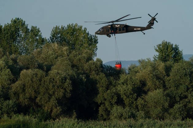 August 24, 2026, Kajtasovo, Vojvodina, Serbia: 2026823, Kajtasovo, Serbia -The European Union is actively assisting Serbia in battling severe wildfires at Serbia s request through the EU Civil Protection Mechanism, deploying four firefighting helicopters from Romania, Slovakia, the Czech Republic, and Germany, alongside ground response teams to contain large blazes like the one in the Deliblato Sands. A Slovak Black Hawk helicopter. Kajtasovo Serbia  - ZUMAd223 20260824_zip_d223_004 Copyright: xMarkoxDimicx