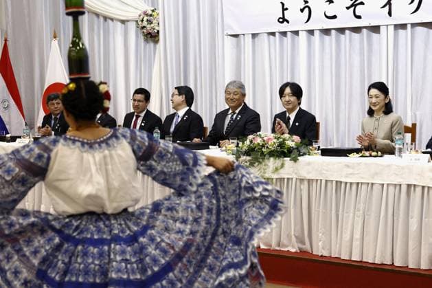CORRECTED: Japan crown prince, crown princess in Paraguay Japan s Crown Prince Fumihito and Crown Princess Kiko watch a dance at a luncheon in Yguazu on Aug. 23, 2026, during their official trip to Paraguay to mark 90 years of Japanese immigration to the South American country.  A14AA0005626555P