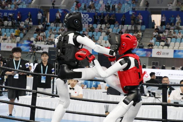 World Humanoid Robot Games in Beijing BEIJING, CHINA - AUGUST 24: Humanoid robots compete in kickbox tournaments within the second edition of World Humanoid Robot Games in Beijing, China on August 24, 2026. Emre Aytekin Anadolu Beijing China. Editorial use only. Please get in touch for any other usage.  Copyright: x2026xAnadoluxEmrexAytekinx