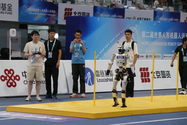 World Humanoid Robot Games in Beijing BEIJING, CHINA - AUGUST 24: Humanoid robots compete in 400-meter hurdles race within the second edition of World Humanoid Robot Games in Beijing, China on August 24, 2026. Emre Aytekin Anadolu Beijing China. Editorial use only. Please get in touch for any other usage.  Copyright: x2026xAnadoluxEmrexAytekinx