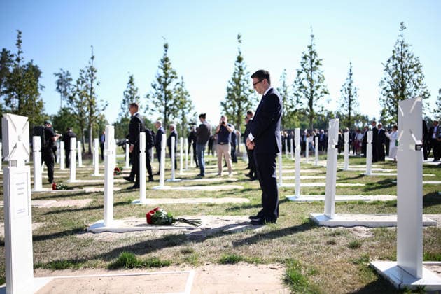 British PM Andy Burnham visits Ukraine Britain s prime minister Andy Burnham collects his thoughts after laying a wreath of flowers during a ceremony at Ukraine s national military memorial cemetery in Hatne, southwest of Kyiv on August 24, 2026. Ukraine hosts a meeting of its key European backers on August 24 to press for critical air-defence supplies and more pressure on Moscow, with Russian attacks killing more civilians than at any time since the first months of the invasion., Credit:HENRY NICHOLLS PA ROTA - B68 Avalon Ukraine, Hatne  Copyright: xHENRYxNICHOLLSx xPAxROTAx-xB68x xAvalonx 1128172028