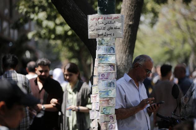 Daily life continues in Tehran as tensions between Iran and the US persist TEHRAN, IRAN - AUGUST 24: (RESTRICTIONS: NO Access Israel Media Persian Language TV Stations Outside Iran Strictly No Access BBC Persian VOA Persian Manoto TV Iran International TV) A view of banknotes hung on a tree as tensions between Iran and the United States persist in the Iranian capital Tehran, on August 24, 2026. US President Donald Trump said he had announced an unprecedented economic D-Day operation targeting Iran and threatened countries supporting the Tehran administration with severe economic consequences. Fatemeh Bahrami Anadolu Tehran Iran. Editorial use only. Please get in touch for any other usage.  Copyright: x2026xAnadoluxFatemehxBahramix