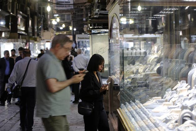 Daily life continues in Tehran as tensions between Iran and the US persist TEHRAN, IRAN - AUGUST 24: (RESTRICTIONS: NO Access Israel Media Persian Language TV Stations Outside Iran Strictly No Access BBC Persian VOA Persian Manoto TV Iran International TV) People look at the display window of a jewelry store as daily life continues amid persistent tensions between Iran and the United States in the Iranian capital Tehran, on August 24, 2026. US President Donald Trump said he had announced an unprecedented economic D-Day operation targeting Iran and threatened countries supporting the Tehran administration with severe economic consequences. Fatemeh Bahrami Anadolu Tehran Iran. Editorial use only. Please get in touch for any other usage.  Copyright: x2026xAnadoluxFatemehxBahramix