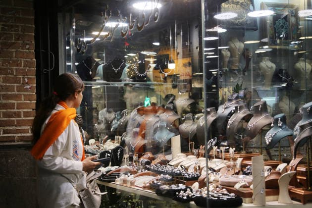 Daily life continues in Tehran as tensions between Iran and the US persist TEHRAN, IRAN - AUGUST 24: (RESTRICTIONS: NO Access Israel Media Persian Language TV Stations Outside Iran Strictly No Access BBC Persian VOA Persian Manoto TV Iran International TV) A woman looks at the display window of a jewelry store as daily life continues amid persistent tensions between Iran and the United States in the Iranian capital Tehran, on August 24, 2026. US President Donald Trump said he had announced an unprecedented economic D-Day operation targeting Iran and threatened countries supporting the Tehran administration with severe economic consequences. Fatemeh Bahrami Anadolu Tehran Iran. Editorial use only. Please get in touch for any other usage.  Copyright: x2026xAnadoluxFatemehxBahramix