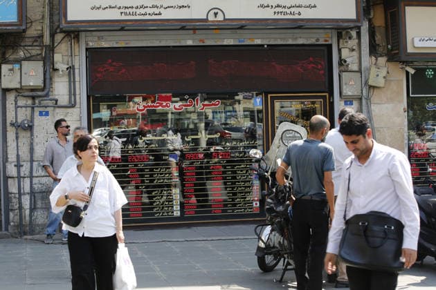 Daily life continues in Tehran as tensions between Iran and the US persist TEHRAN, IRAN - AUGUST 24: (RESTRICTIONS: NO Access Israel Media Persian Language TV Stations Outside Iran Strictly No Access BBC Persian VOA Persian Manoto TV Iran International TV) Currency exchange office is seen as daily life continues amid persistent tensions between Iran and the United States in the Iranian capital Tehran, on August 24, 2026. US President Donald Trump said he had announced an unprecedented economic D-Day operation targeting Iran and threatened countries supporting the Tehran administration with severe economic consequences. Fatemeh Bahrami Anadolu Tehran Iran. Editorial use only. Please get in touch for any other usage.  Copyright: x2026xAnadoluxFatemehxBahramix