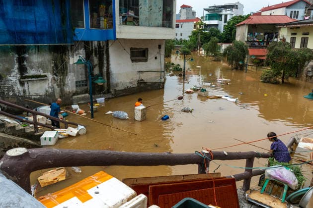 Typhoon Narra floods Lang Son, Vietnam LANG SON, VIETNAM - AUGUST 24: Residents and soldiers clear debris and assist with cleanup operations following flooding in L?ng Son, Vietnam, on August 24, 2026. The flooding, caused by heavy rains associated with Typhoon No. 4, has affected homes, roads and businesses across the province. Magdalena Chodownik Anadolu Lang Son Vietnam. Editorial use only. Please get in touch for any other usage.  Copyright: x2026xAnadoluxMagdalenaxChodownikx