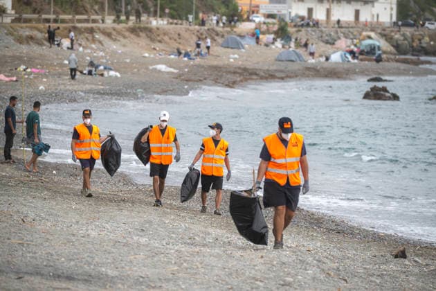 Cleaning Services at El Trampolín Beach in Ceuta Cleaning services at El Trampolín Beach, as of August 24, 2026, in Ceuta, Spain. Cleaning crews are responsible for sweeping and disinfecting the area after it has been cleared. In recent days, this beach has become the true epicenter of the migration crisis facing the Autonomous City since the mass influx on July 30 and 31 July 24, 2026, Ceuta, Ceuta, Spain  Copyright: xMarcosxMorenox 7730256