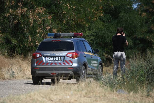 NATO Hungarian Air Force Gripen Crashes In Hungary Military police are stationed near the perimeter of the Kiss Jozsef Helicopter Base Airbase in Szolnok, Hungary, on August 24, 2026. A Saab JAS 39 Gripen crashed earlier after the pilot ejected. Budapest Hungary  Copyright: xBalintxSzentgallayx originalFilename: szentgallay-natohung260824_np1BW.jpg