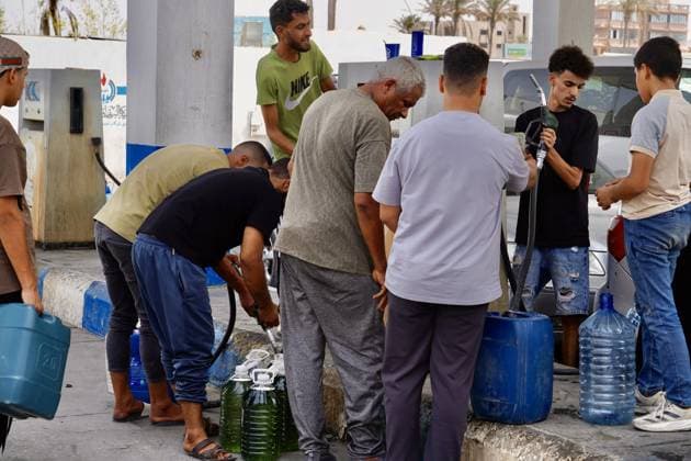 Libya s electricity and fuel crisis continues TRIPOLI, LIBYA - AUGUST 24: People are seen at a gas station in Tripoli, Libya, amid a fuel crisis following drone attacks on an electricity conversion station and Libya s largest oil complex in the western city of Zawiya, on August 24, 2026. The attacks caused severe power outages and fuel shortages in the region. Hazem Turkia Anadolu Tripoli Libya. Editorial use only. Please get in touch for any other usage.  Copyright: x2026xAnadoluxHazemxTurkiax