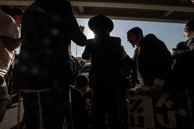 Haredi Jews protest mandatory military service in Bnei Brak BNEI BRAK, ISRAEL - AUGUST 24: Ultra-Orthodox Jews, known as Haredim, gather to protest mandatory military service, blocking one of the city s main roads in Bnei Brak near Tel Aviv, Israel on August 24, 2026. The protesters, wearing traditional black suits, white shirts and black hats, demonstrate against a government bill that proposes fines and other sanctions for those refusing military service. Mostafa Alkharouf Anadolu Bnei Brak Israel. Editorial use only. Please get in touch for any other usage.  Copyright: x2026xAnadoluxMostafaxAlkharoufx