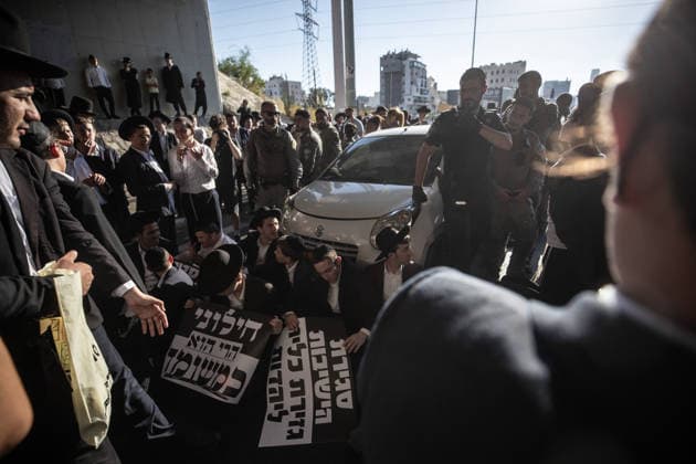 Haredi Jews protest mandatory military service in Bnei Brak BNEI BRAK, ISRAEL - AUGUST 24: Ultra-Orthodox Jews, known as Haredim, gather to protest mandatory military service, blocking one of the city s main roads in Bnei Brak near Tel Aviv, Israel on August 24, 2026. The protesters, wearing traditional black suits, white shirts and black hats, demonstrate against a government bill that proposes fines and other sanctions for those refusing military service. Mostafa Alkharouf Anadolu Bnei Brak Israel. Editorial use only. Please get in touch for any other usage.  Copyright: x2026xAnadoluxMostafaxAlkharoufx