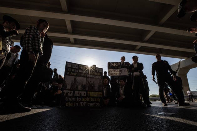 Haredi Jews protest mandatory military service in Bnei Brak BNEI BRAK, ISRAEL - AUGUST 24: Ultra-Orthodox Jews, known as Haredim, gather to protest mandatory military service, blocking one of the city s main roads in Bnei Brak near Tel Aviv, Israel on August 24, 2026. The protesters, wearing traditional black suits, white shirts and black hats, demonstrate against a government bill that proposes fines and other sanctions for those refusing military service. Mostafa Alkharouf Anadolu Bnei Brak Israel. Editorial use only. Please get in touch for any other usage.  Copyright: x2026xAnadoluxMostafaxAlkharoufx