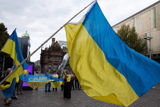 August 24, 2026, Glasgow, Scotland, UK: Members of Scotlands Ukrainian community gathered in Glasgow to mark the 35th anniversary of Ukraines independence. The event included a minutes silence and shared prayer, speeches, the formation of a large human Ukrainian flag, and the international Chain of Unity and The Free World Gathering, connecting Ukrainians and supporters of Ukraine in cities around the world. Glasgow UK - ZUMAs357 20260824_zip_s357_003 Copyright: xCameronxScottx