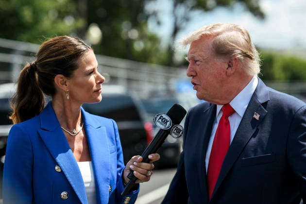 August 24, 2026, Washington, Dc, United States: U.S. President Donald Trump, is interviewed by Fox Sports Commentator Jamie Little, left, before the start of the Freedom 250 Grand Prix Race, August 23, 2026 in Washington, D.C. Washington United States - ZUMAp138 20260824_zaa_p138_030 Copyright: xDanielxTorok WhitexHousex