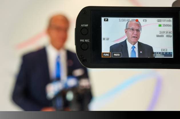 August 24, 2026, Tampa, Florida, USA: Tampa International Airport Chief Operating Officer John Tiliacos is seen on the screen from a video camera as he answers questions from reporters during a new conference at SkyCenter One at the airport on Monday, Aug. 24, 2026 in Tampa. Tampa International announced it s not privatizing its security on Monday. Tampa USA - ZUMAs70_ 20260824_zan_s70_001 Copyright: xDirkxShaddx