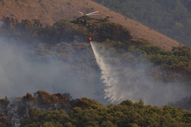 Aerial firefighting efforts battle forest fire near Trapani in Sicily, Italy TRAPANI, ITALY - AUGUST 24: Firefighting aircraft and helicopters battle a forest fire on the slopes of Mount Polizo near Trapani on the Italian island of Sicily, on August 24, 2026. Emergency teams launched an aerial operation, deployed three helicopters and two firefighting planes to contain the blaze and prevent it from spreading across the forested terrain. Alberto Lo Bianco Anadolu Trapani Italy. Editorial use only. Please get in touch for any other usage.  Copyright: x2026xAnadoluxAlbertoxLoxBiancox