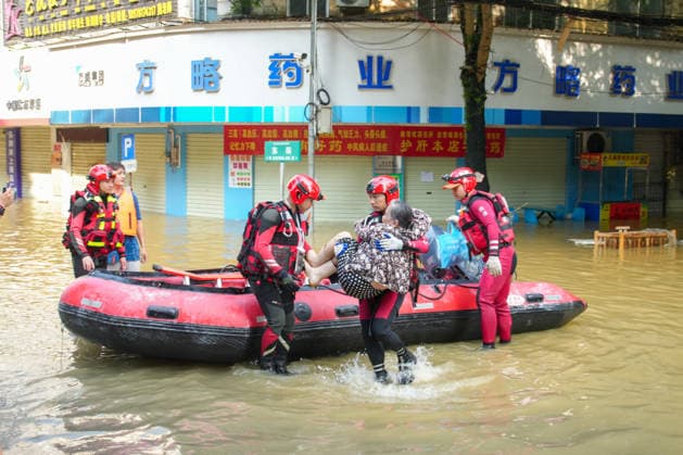 LONGZHOU, CHINA - AUGUST 24: Rescue workers evacuate residents trapped by floods caused by heavy rains from Typhoon Zitan on August 24, 2026 in Longzhou, Guangxi Zhuang Autonomous Region of China. Water levels in the Zuo River rose continuously due to the typhoon and upstream flow, submerging some urban roads while local authorities continued monitoring and rescue operations.  Copyright: xChinaxNewsxServicex 111661931458