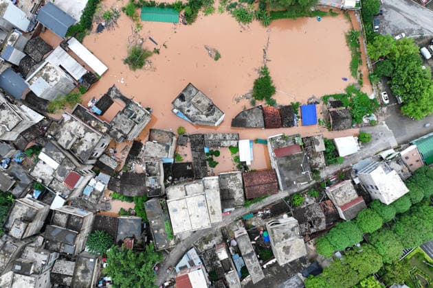 NANNING, CHINA - AUGUST 24: An aerial view shows flooded areas in Ningming County on August 24, 2026 in Nanning, Guangxi Zhuang Autonomous Region of China. Heavy rainfall brought by Typhoon Narra flooded the low-lying areas in south China s Guangxi Zhuang Autonomous Region.  Copyright: xChinaxNewsxServicex 111661873584