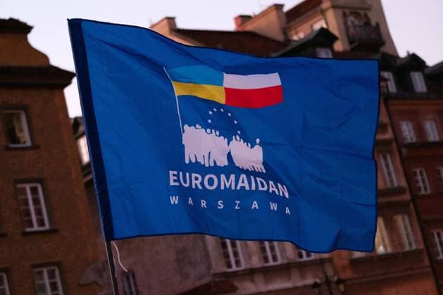 August 24, 2026, Warsaw, Masovian Voivodeship, Poland: Close-up of a flag of Ukrainian diaspora activist group Euromaidan-Warszawa during celebrations of Ukraine s 35th Independence Day in Warsaw, Poland. The event was organized by Ukrainian diaspora organizations and Polish activist groups in solidarity with Ukraine during a time of heightened tensions between Poles and Ukrainian migrants, with recent acts of xenophobic, anti-Ukrainian violence being incited by Polish far-right groups and politicians. Warsaw Poland - ZUMAk204 20260824_zip_k204_011 Copyright: xRomanxKozielx