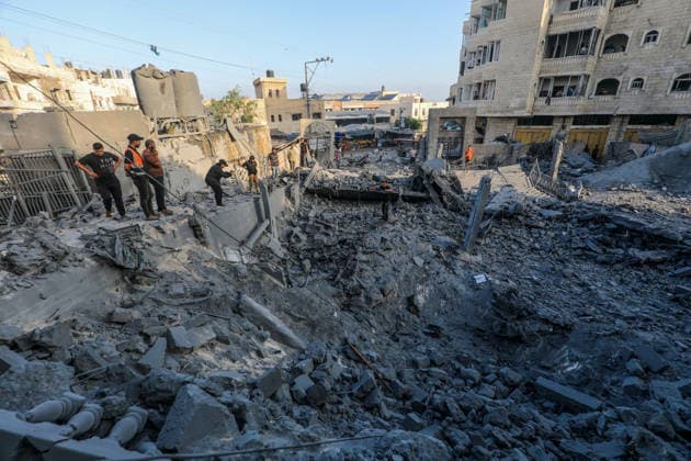 Abu Salim Mosque severely damaged in Israeli airstrike in Deir al-Balah DEIR AL-BALAH, GAZA, PALESTINE - AUGUST 25: Palestinians inspect the destruction at the Abu Salim Mosque and surrounding neighborhood following an Israeli airstrike carried out despite the ceasefire in Deir al-Balah, in the central Gaza Strip, Palestine on August 25, 2026. The strike caused widespread collapse, reduced parts of the religious building to rubble, and damaged nearby residential structures and streets across the area. Moiz Salhi Anadolu Deir al-Balah Gaza. Editorial use only. Please get in touch for any other usage.  Copyright: x2026xAnadoluxMoizxSalhix