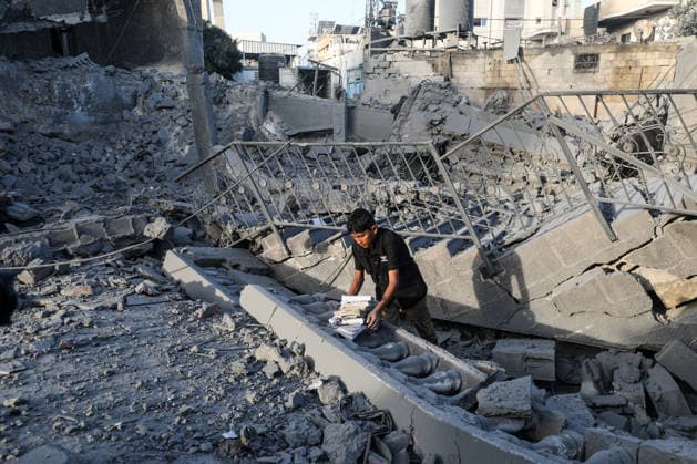 Abu Salim Mosque severely damaged in Israeli airstrike in Deir al-Balah DEIR AL-BALAH, GAZA, PALESTINE - AUGUST 25: A young Palestinian is seen among the rubble of the heavily damaged Abu Salim Mosque and surrounding neighborhood following an Israeli airstrike carried out despite the ceasefire in Deir al-Balah, in the central Gaza Strip, Palestine on August 25, 2026. The strike caused widespread collapse, reduced parts of the religious building to rubble, and damaged nearby residential structures and streets across the area. Moiz Salhi Anadolu Deir al-Balah Gaza. Editorial use only. Please get in touch for any other usage.  Copyright: x2026xAnadoluxMoizxSalhix