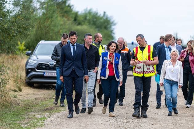 Walloon Minister President Adrien Dolimont and EU Commissioner for Equality, Preparedness and Crisis Management Hadja Lahbib pictured at a visit at the Botrange panorama deck, in Waimes, on Tuesday 25 August 2026. European commissionner Lahbib visit several sites regarding the fire in the Hautes Fagnes (Hugh Fens) wich started on August 14th with 3000 hectares (on a total of 4500) impacted in the nature reserve.  EMILExWINDAL 184244408