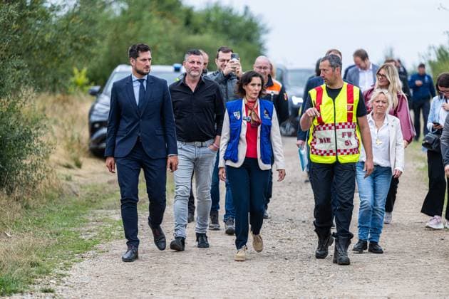 Walloon Minister President Adrien Dolimont and EU Commissioner for Equality, Preparedness and Crisis Management Hadja Lahbib pictured at a visit at the Botrange panorama deck, in Waimes, on Tuesday 25 August 2026. European commissionner Lahbib visit several sites regarding the fire in the Hautes Fagnes (Hugh Fens) wich started on August 14th with 3000 hectares (on a total of 4500) impacted in the nature reserve.  EMILExWINDAL 184244413