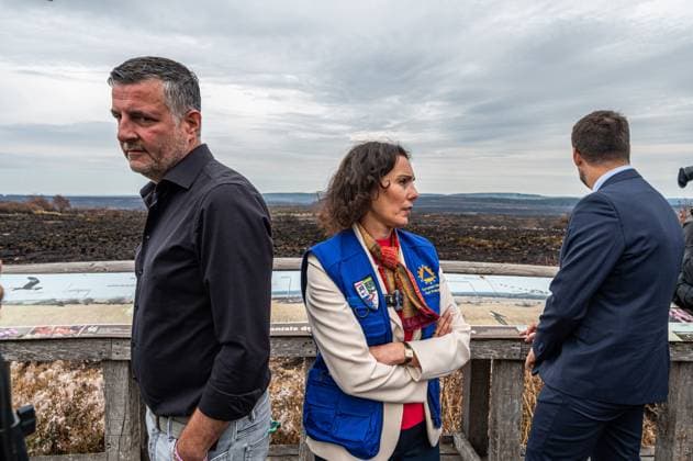 Walloon Minister President Adrien Dolimont and EU Commissioner for Equality, Preparedness and Crisis Management Hadja Lahbib pictured at a visit at the Botrange panorama deck, in Waimes, on Tuesday 25 August 2026. European commissionner Lahbib visit several sites regarding the fire in the Hautes Fagnes (Hugh Fens) wich started on August 14th with 3000 hectares (on a total of 4500) impacted in the nature reserve.  EMILExWINDAL 184245100