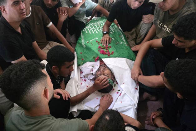 Palestinians Bury Three People in Khan Younis Palestinians attend the funeral of three people in Khan Younis, in the southern Gaza Strip, on August 25, 2026. Two died from wounds sustained in previous Israeli strikes, while the third was killed in an Israeli strike the previous evening. Photo by Tariq Mohammad APA Images Khan Yunis Gaza Strip Palestinian Territory 250826_Khan_Yunis_TM_04(22) Copyright: xapaimagesxTariqxMohammad xapaimagesx