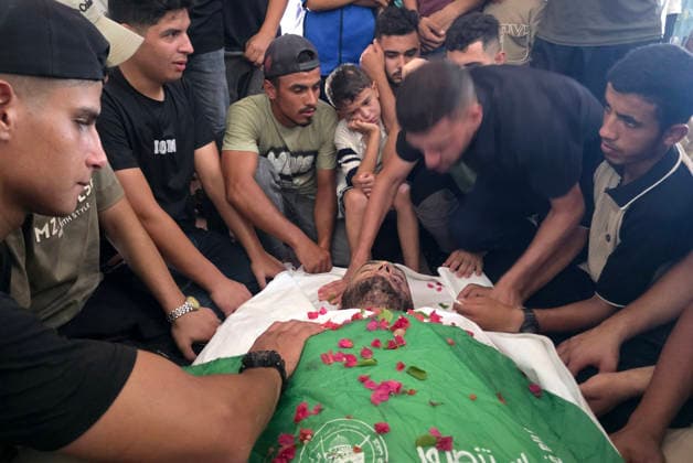 Palestinians Bury Three People in Khan Younis Palestinians attend the funeral of three people in Khan Younis, in the southern Gaza Strip, on August 25, 2026. Two died from wounds sustained in previous Israeli strikes, while the third was killed in an Israeli strike the previous evening. Photo by Tariq Mohammad APA Images Khan Yunis Gaza Strip Palestinian Territory 250826_Khan_Yunis_TM_04(10) Copyright: xapaimagesxTariqxMohammad xapaimagesx