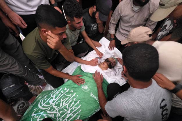 Palestinians Bury Three People in Khan Younis Palestinians attend the funeral of three people in Khan Younis, in the southern Gaza Strip, on August 25, 2026. Two died from wounds sustained in previous Israeli strikes, while the third was killed in an Israeli strike the previous evening. Photo by Tariq Mohammad APA Images Khan Yunis Gaza Strip Palestinian Territory 250826_Khan_Yunis_TM_04(6) Copyright: xapaimagesxTariqxMohammad xapaimagesx