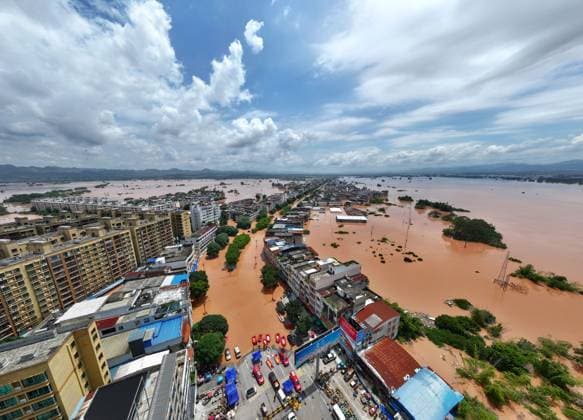 (260825) -- CHONGZUO, Aug. 25, 2026 -- An aerial drone photo taken on Aug. 25, 2026 shows a view of Ningming County, Chongzuo City, south China s Guangxi Zhuang Autonomous Region. Continuous heavy rainfalls caused by Typhoon Narra, the 19th typhoon of the year, have swept many areas in Ningming. Local authorities have fully engaged in rescue and relief efforts. As of 12:00 p.m. (Beijing Time) on Tuesday, 22,008 stranded civilians had been transferred. ) CHINA-GUANGXI-NINGMING-TYPHOON-STRANDED RESIDENTS-TRANSFER (CN) ZhouxHua 