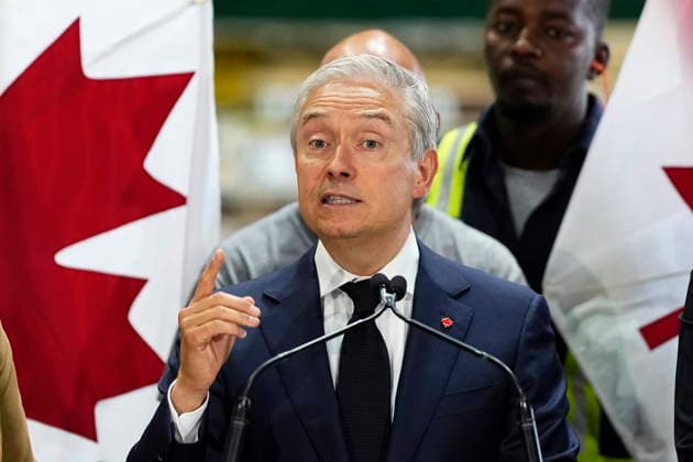 August 25, 2026, Ottawa, On, CAN: Minister of Finance and National Revenue Francois-Philippe Champagne speaks at a news conference on Canada s response to U.S. tariffs, at a roofing company in Ottawa, on Tuesday, Aug. 25, 2026. Ottawa CAN  - ZUMAc35_ 20260825_zaf_c35_011 Copyright: xJustinxTangx