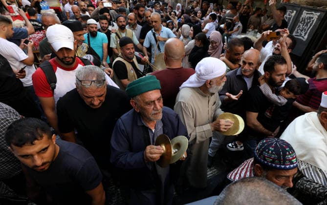 Mawlid al-Nabi in Nablus NABLUS, WEST BANK, PALESTINE - AUGUST 25: Palestinian religious figures and residents take part in a street procession to mark Mawlid al-Nabi, the anniversary of the birth of Prophet Muhammad, in Nablus, West Bank, Palestine on August 25, 2026. Participants wearing traditional clothing chant religious songs accompanied by tambourines and drums during the celebrations. Nedal Eshtayah Anadolu Nablus West Bank. Editorial use only. Please get in touch for any other usage.  Copyright: x2026xAnadoluxNedalxEshtayahx