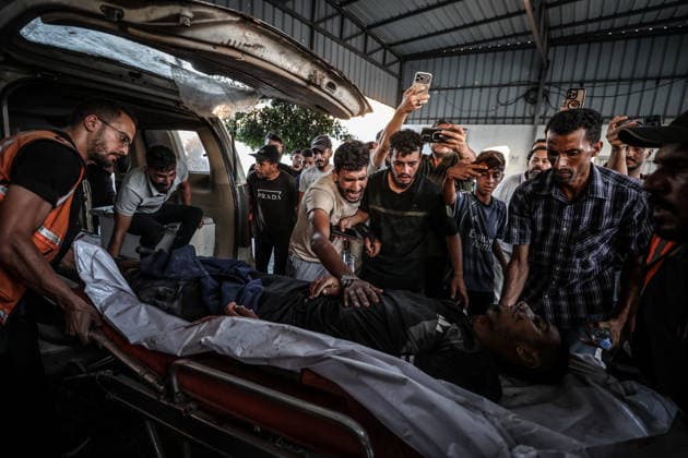 Three Palestinians lost their lives following Israeli attack on Jabalia refugee camp in Gaza GAZA CITY, GAZA, PALESTINE - AUGUST 25: (EDITOR S NOTE: Image depicts death) Relatives of Palestinians, who lost their lives following the Israeli attack on Jabalia refugee camp, mourn as the bodies are brought to al-Shifa Hospital for funeral process in Gaza City, Gaza, Palestine on August 25, 2026. Ali Jadallah Anadolu Gaza City Gaza. Editorial use only. Please get in touch for any other usage.  Copyright: x2026xAnadoluxAlixJadallahx
