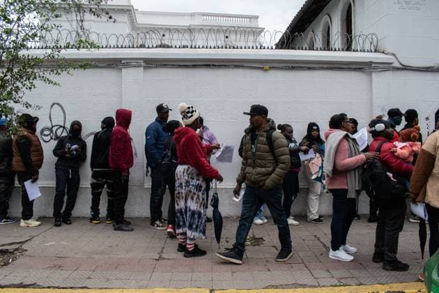Haitians seek immigration regularization in Santiago SANTIAGO, CHILE, AUGUST 25, 2026: Haitian citizens gather at the Consulate of Haiti in Santiago to complete paperwork related to the regularization of their immigration status in Chile. Santiago Chile Copyright: x xVicentexAsenciox xJNAxPressx