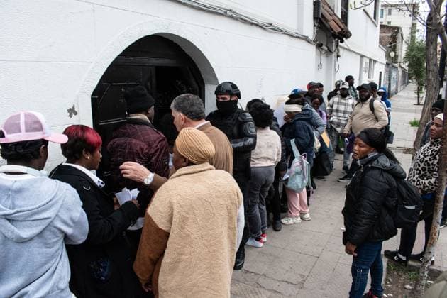 Haitians seek immigration regularization in Santiago SANTIAGO, CHILE, AUGUST 25, 2026: Haitian citizens gather at the Consulate of Haiti in Santiago to complete paperwork related to the regularization of their immigration status in Chile. Santiago Chile Copyright: x xVicentexAsenciox xJNAxPressx