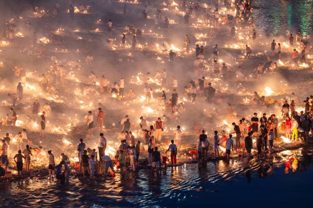 KAILI, CHINA - AUGUST 25: People burn paper offerings in designated areas to pay tribute to their departed loved ones ahead of the Zhongyuan Festival (Ghost Festival) on August 25, 2026 in Kaili, Guizhou Province of China. The Ghost Festival, also known as Zhongyuan Festival, is a traditional festival for paying respect to the dead.  Copyright: xVCGx 111662157016
